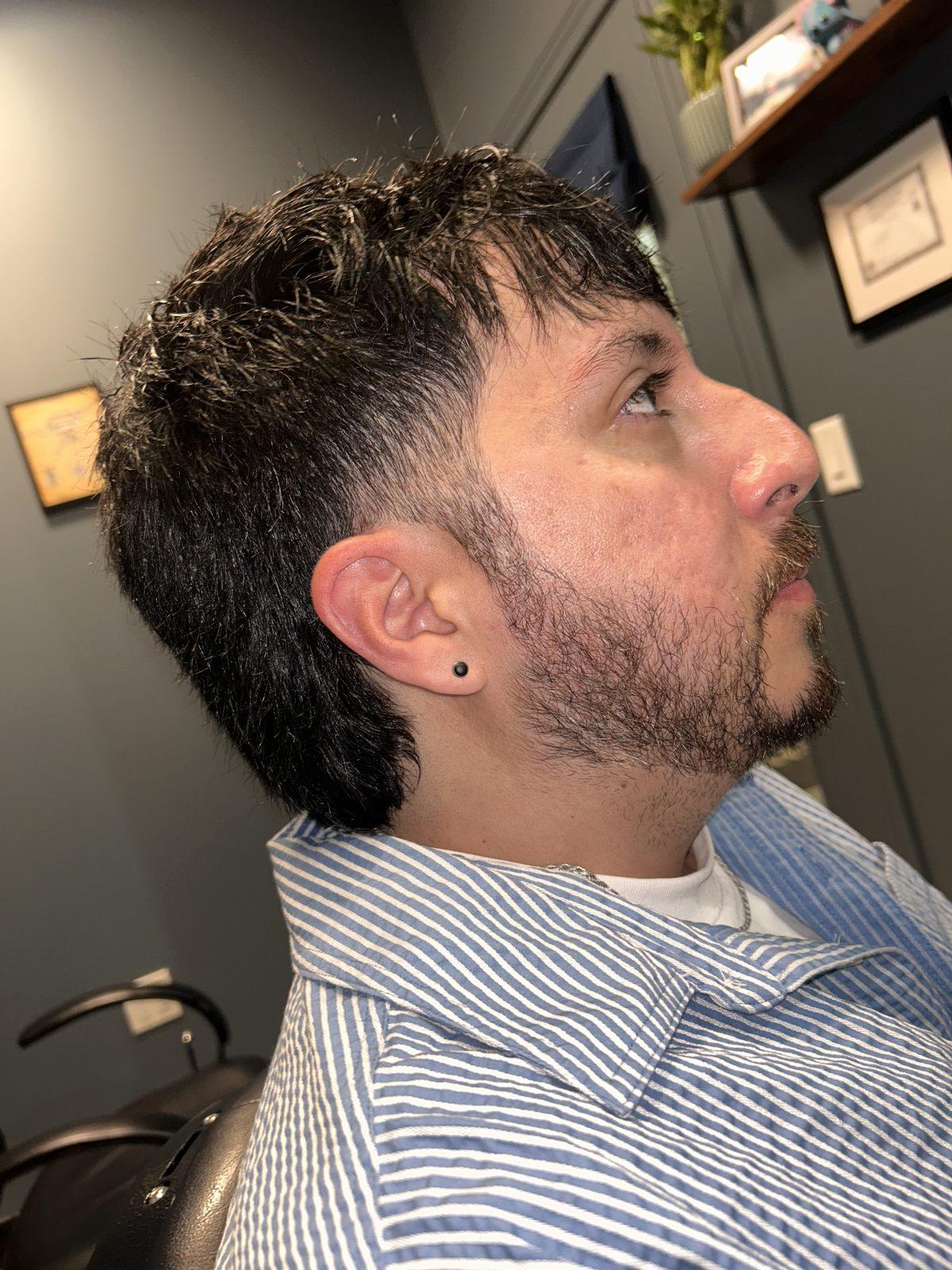Textured cut with a full beard and a clean cheek line